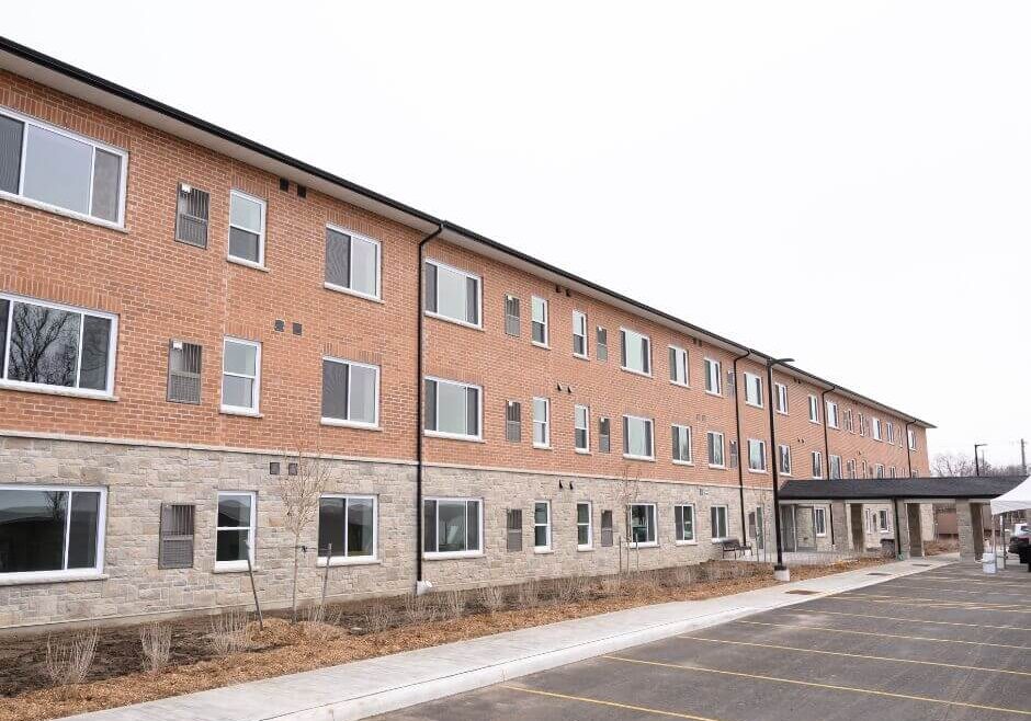 Exterior shot of a multi unit brick building